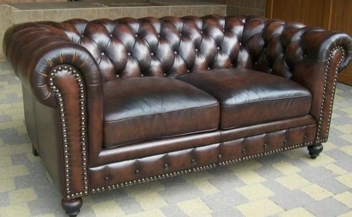 Brown Chesterfield sofa after cleaning and conditioning